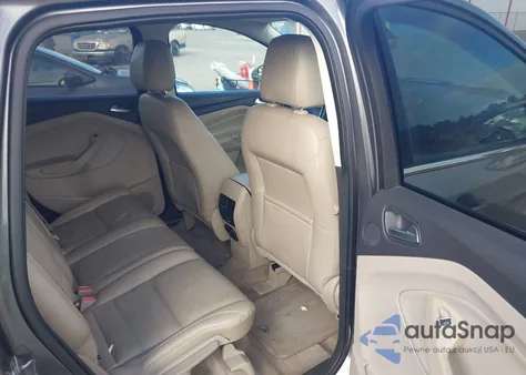 2014 Ford Escape Titanium z USA, uszkodzony, nr VIN 1FMCU0JX7EUC64583